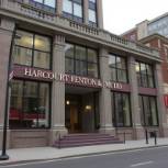 Exterior view of HARCOURT, FENTON & MUDD, a large law firm.